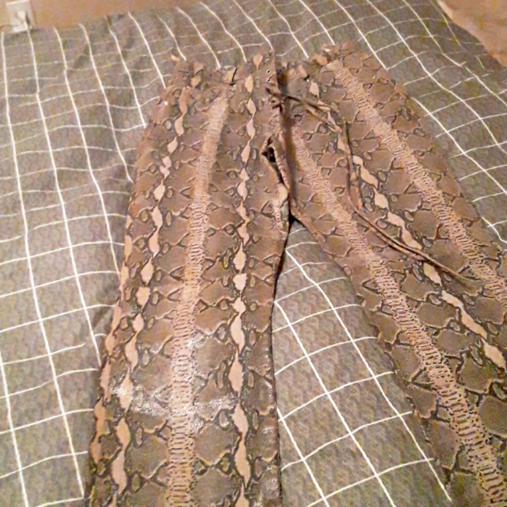 Snakeskin  pants.